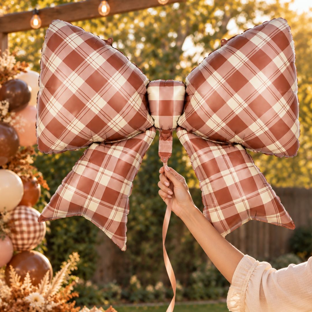Fall Gingham Plaid Bow 38.58 in x 29.13 in brown foil balloon for fall birthdays, fall parties, Thanksgiving dinner parties, brown theme parties. Main image
