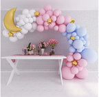 Macaron Pink Blue Foil Moon Balloon Garland Kit with pastel decorations