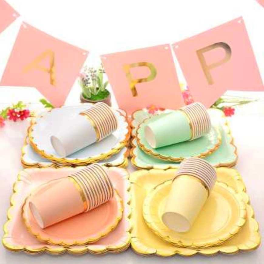 Colorful party tableware display with plates, cups, and decorations for events. Ideal for birthdays, weddings, and celebrations.