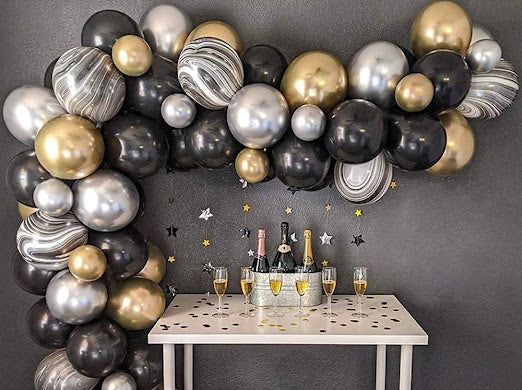 Matte Black, Metallic Gold, Agate Black 120 pcs balloon garland kit on display for party decorations and themed celebrations. Main image