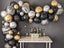 Matte Black, Metallic Gold, Agate Black 120 pcs balloon garland kit on display for party decorations and themed celebrations.