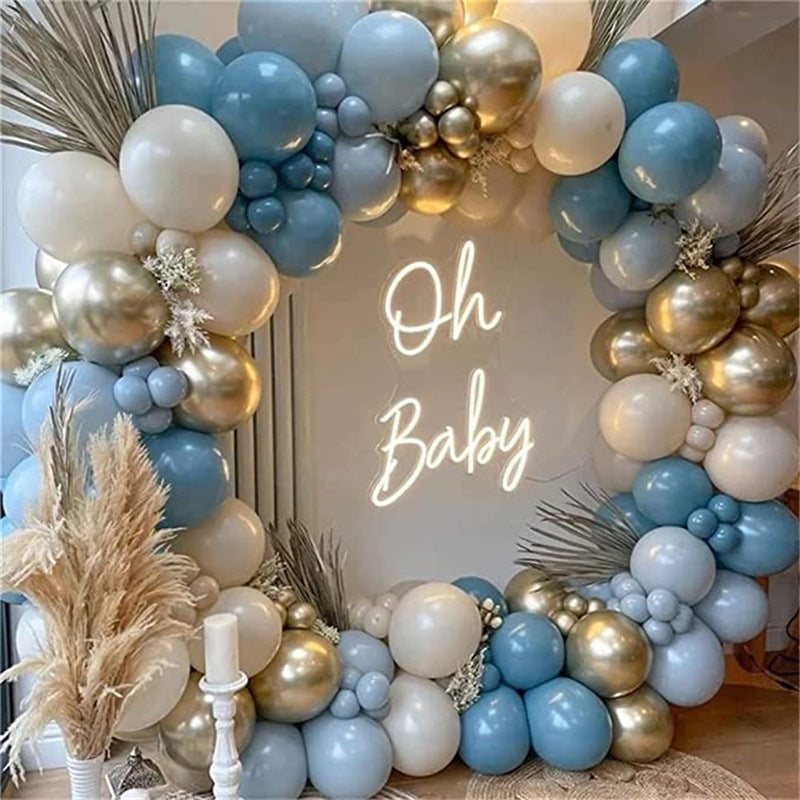 Retro aquamarine, ice mist blue, chrome gold 167 pcs balloon garland kit with party decorations and 'Oh Baby' sign.