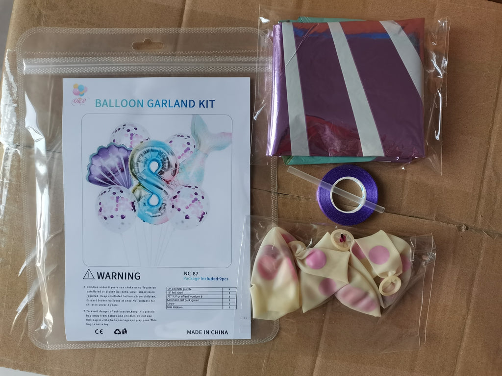 Mermaid Tail Number Balloon Garland 9pcs kit with party supplies, perfect for birthday or themed celebrations.
