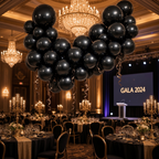 Party Paradise Store black metallic latex balloons arranged in a large arch for an elegant gala event decoration