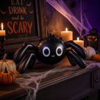 Party Paradise Store black spider balloon decoration on a mantelpiece with candles and pumpkins for Halloween