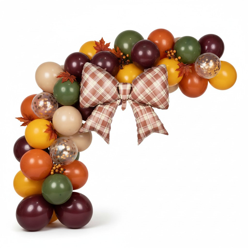 Party Paradise Store fall balloon arch featuring a large gingham plaid bow, autumn leaves, and brown and orange balloons