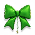 Party Paradise Store green bow-shaped foil balloon for Christmas holiday parties and festive photoshoots