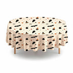 Party Paradise Store round Halloween table cover with a cream background and black and orange spooky icons