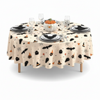 Party Paradise Store round Halloween table cover with festive bat, ghost, and pumpkin print on a cream background