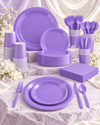 Party Paradise Store 141-piece lavender purple disposable tableware set with plates, cups, napkins, and cutlery for parties.