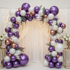 Party Paradise Store purple and white chrome latex balloon arch decorated with flowers for a wedding or party event