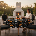 Party Paradise Store round Halloween tablecloth with jack-o'-lanterns and ghosts on a patio table setting