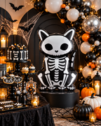 Party Paradise Store skeleton cat foil balloon in black and white, featured in a spooky Halloween party display.